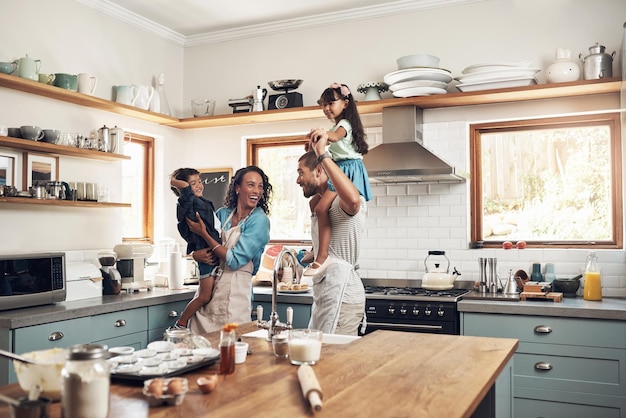 The secret ingredient in baking is always love Shot of a young family spending quality time together in the kitchen at home