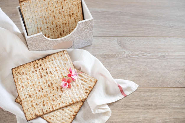 Seder Pesach celebration concept jewish Passover holiday Matzah in a special box with an inscription matzo Top view