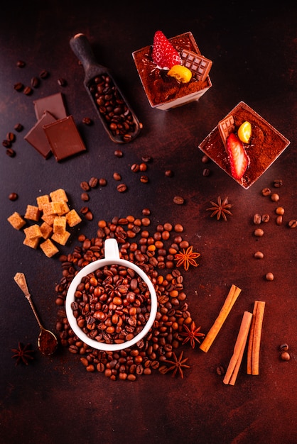 Seeds of fragrant coffee on a dark concrete background