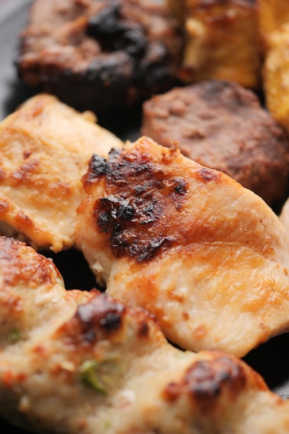 Seekh Kabab Naan bread and sauce on a plate