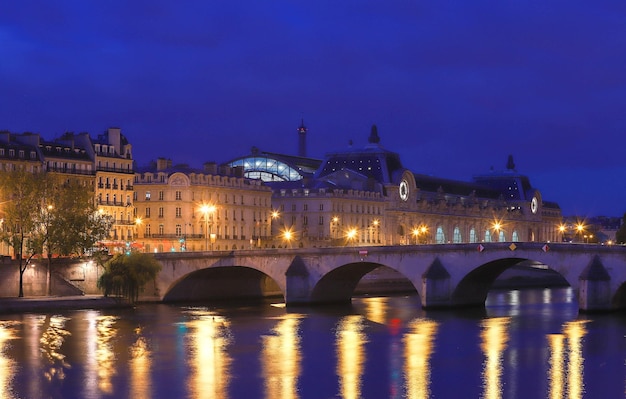 Seine River banks Pont Royal bridge and Orsay Museum in the early morning Paris France