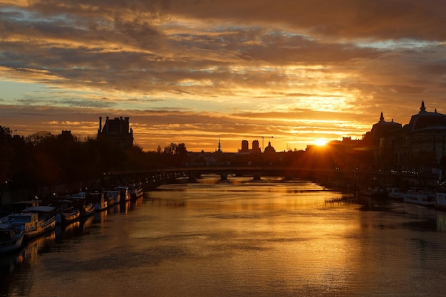 Seine river and Old Town of Paris France in the beautiful sunrise A nice skyline of famous touristic destination with Notre Dame de Paris