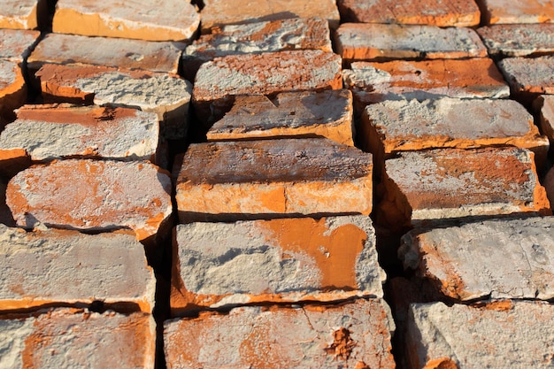 Selected red bricks Reuse of bricks for the construction of a new house