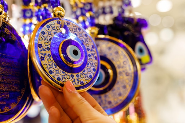 Selection of traditional colorful beads chain or gifts on display at a Turkish market in Grand Bazaar istanbulTurkey