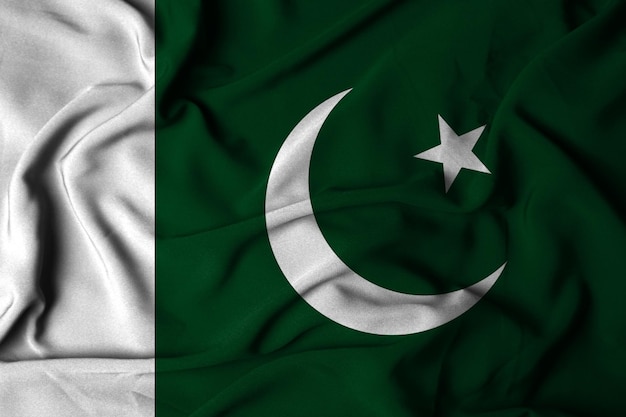 Selective focus of pakistan flag with waving fabric texture 3d illustration