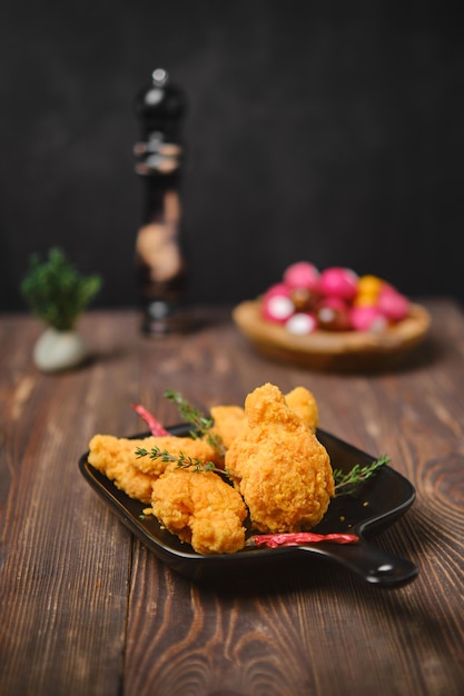 Selective focus photo of deep fried breaded chicken wings