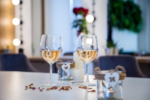 Selective focus shot of two glasses of white wine