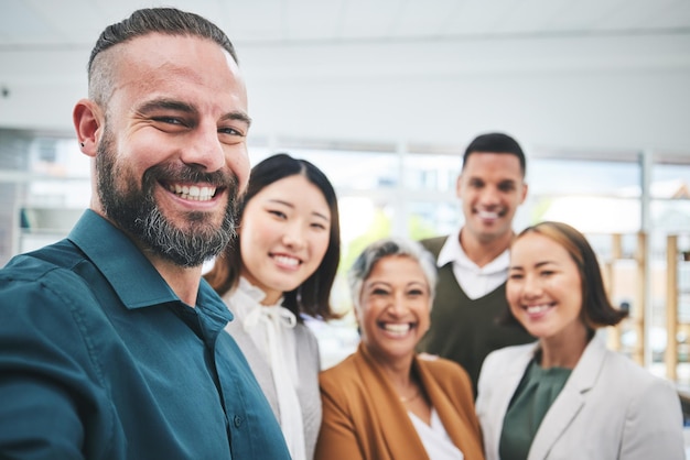 Selfie portrait and happy business people together in office for team building collaboration and global company Diversity employees and face of friends smile for profile picture on social media