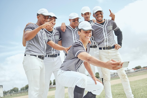 Selfie team and baseball happy and sports men baseball player together with smartphone and fitness for game on grass pitch Motivation athlete and technology sport club on baseball field