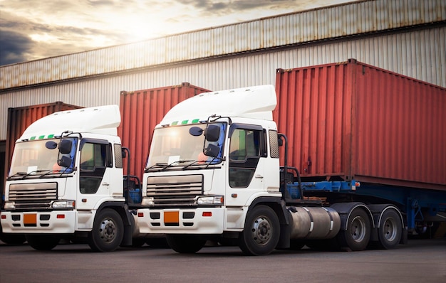 Semi Trailer Trucks Parked Loading Dock at Dock Warehouse. Delivery Shipping Warehouse logistics