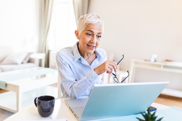 Senior businesswoman working from home