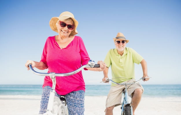 Senior couple going for a bike ride