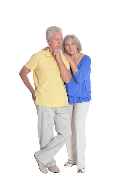 Senior couple hugging isolated on white background full length