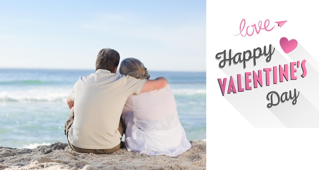 Senior couple looking at the sea against cute valentines message