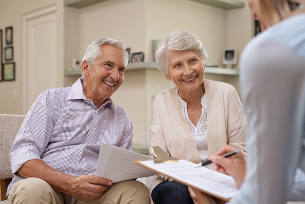 Senior couple meeting financial advisor