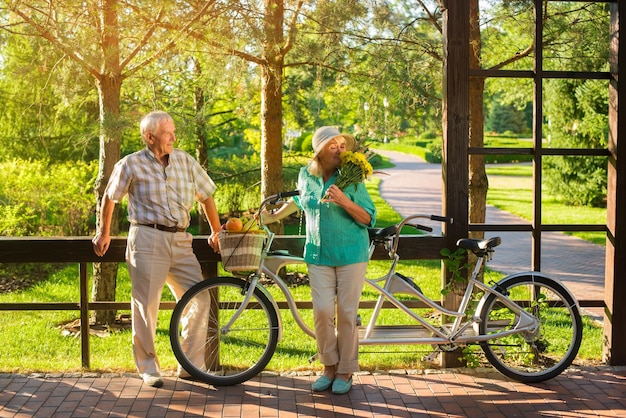 Senior couple and tandem bicycle