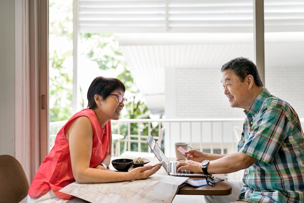 Senior Couple Using Laptop Concept