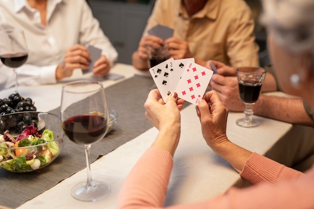 Senior friends having a party at night