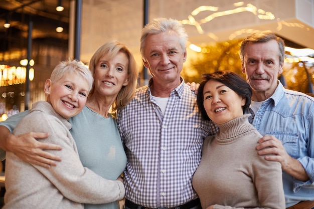 Senior friends posing together