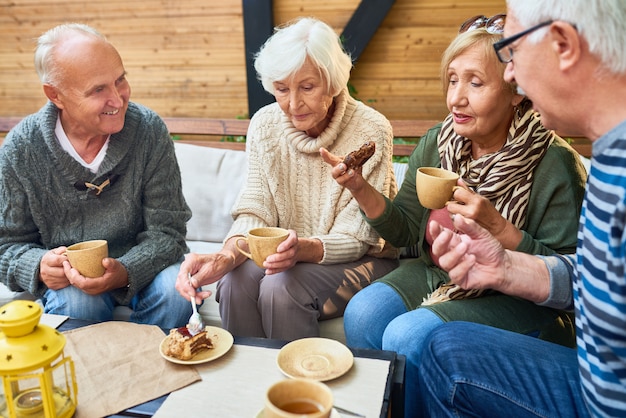 Senior friends together at a cafe