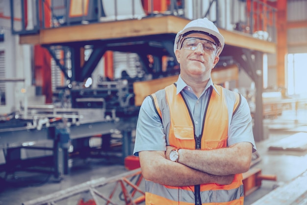 Senior Heavy Industry Worker workman service team working in metal factory Portrait Happy smiling