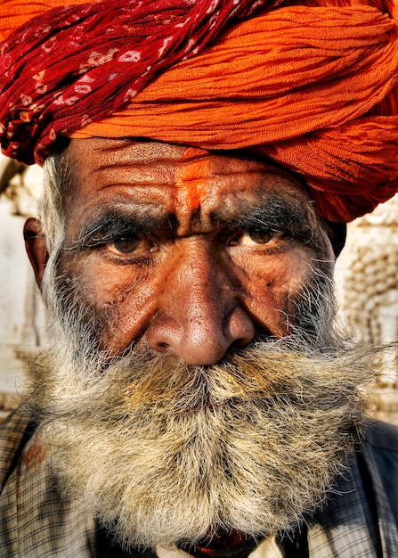 Senior Indian man looking at the camera.