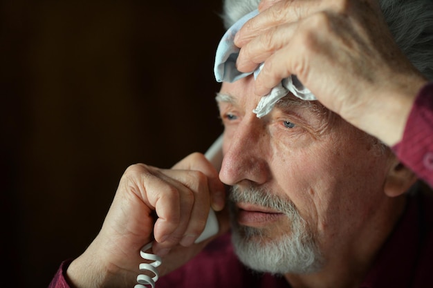 Senior man talking on phone