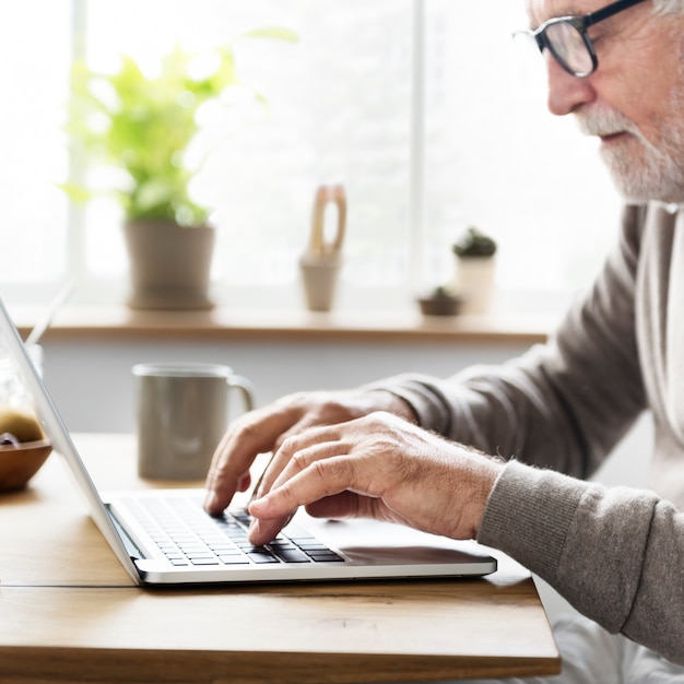 Senior man using a laptop