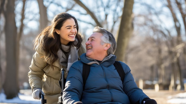 Senior man in wheelchair with his daughter in autumn park