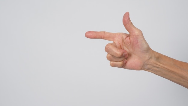 Senior or older woman hand is pointing on white background.