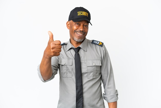 Senior staff man isolated on white wall with thumbs up because something good has happened