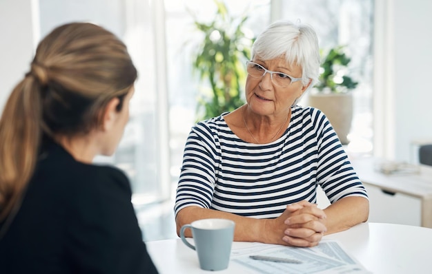 Senior woman advisor and talking about insurance savings or retirement plan Elderly client person