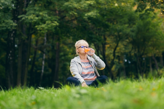 Senior woman exercising in the park