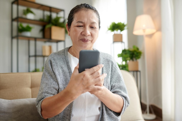 Senior Woman Reading Text Message