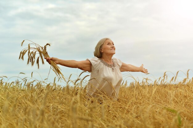 Senior woman in summer field