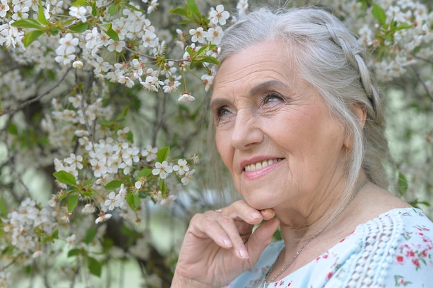 Senior woman in summer park