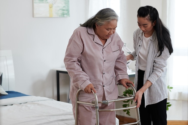 Senior Woman Using Walker