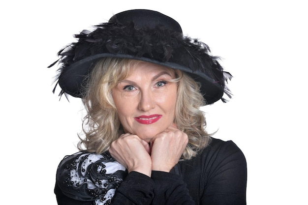 Senior woman wearing black hat