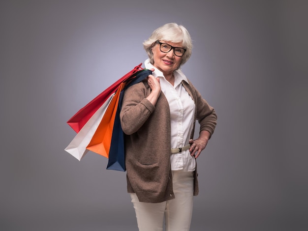 Senior woman with shopping bags