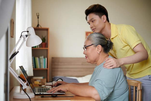 Senior Woman Working on Laptop