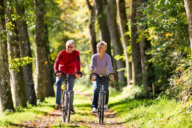 Seniors exercising with bicycle