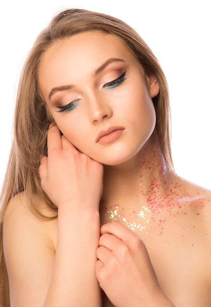 Sensual woman with professional makeup and glitter on her neck. Closeup shot