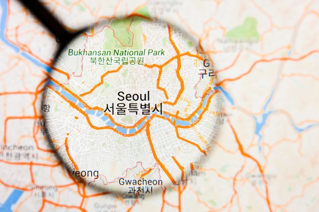 Seoul, South Korea city visualization illustrative concept on display screen through magnifying glass