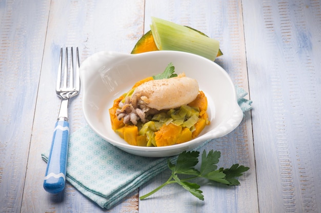 Sepia with steamed pumpkins and leek salad