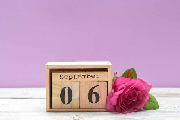 September 6. Image of September 6 wooden calendar on wooden table . Autumn day