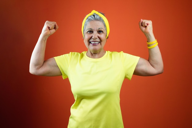 September 7th Brazil Independence Day Mature Woman with Gray Hair yellow shirt isolated