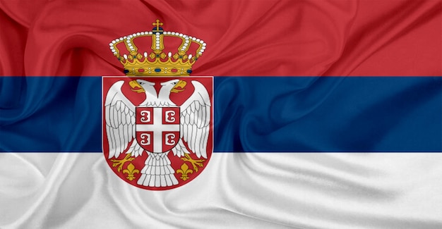 Photo serbia flag flying in the wind