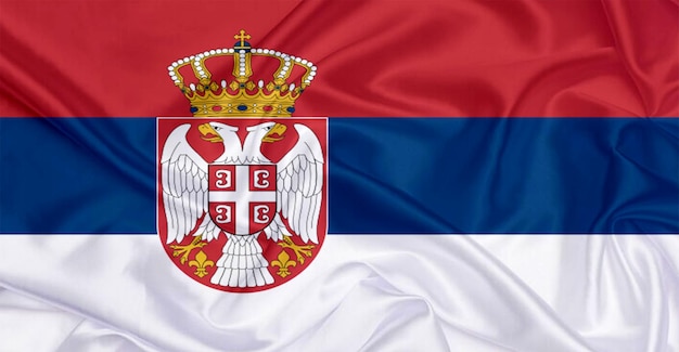 Photo serbia flag flying in the wind