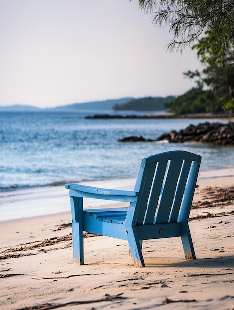 Photo serene beachfront retreat tranquil blue chair on sandy shore