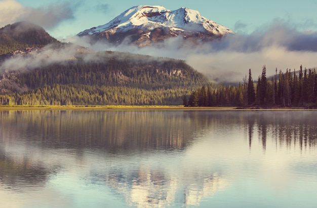 Serene beautiful lake in morning mountains, Oregon, USA.